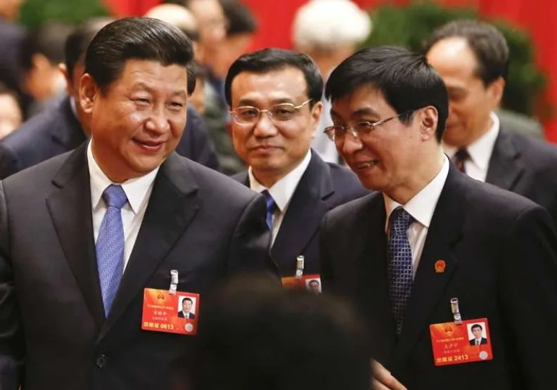 對台工作小組組長習近平（左）、副小組長王滬寧（右）。中新網