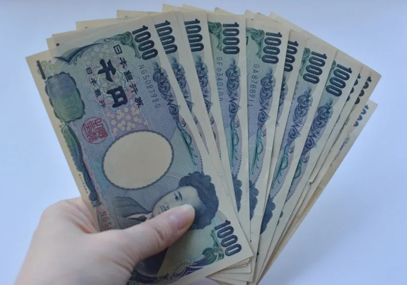 日銀可能修正目前的大規模貨幣寬鬆政策，導致日圓驟升。取自PhotoAC