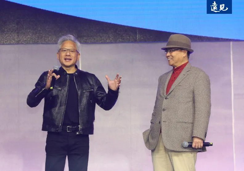 輝達（NVIDIA）創辦人黃仁勳現身緯創尾牙。圖右為緯創董事長林憲銘。蘇義傑攝