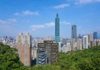 便當店的例子，想表達房價高居不下的哪個問題？